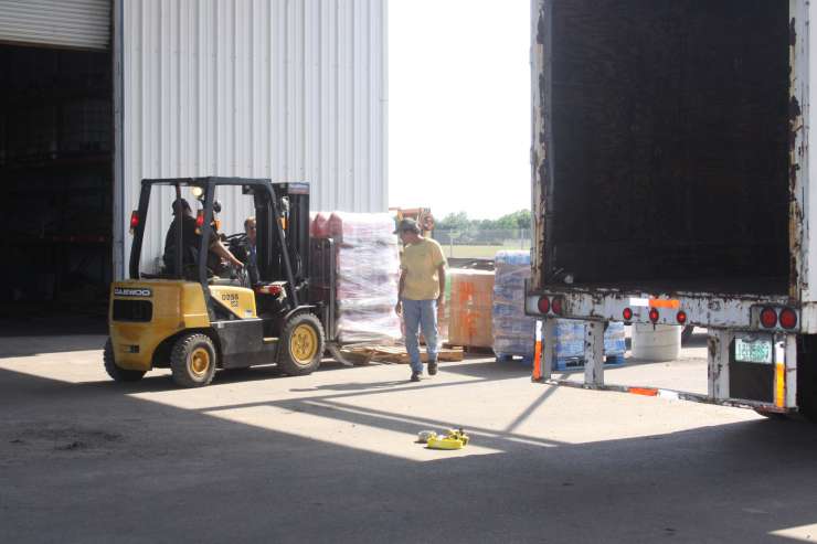 Blimp Base Storage stages and loads shipment of disaster relief supplies Shipment of disaster relief supplies